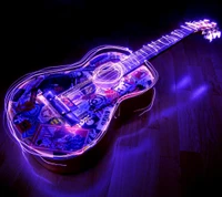 Guitarra iluminada con pegatinas coloridas