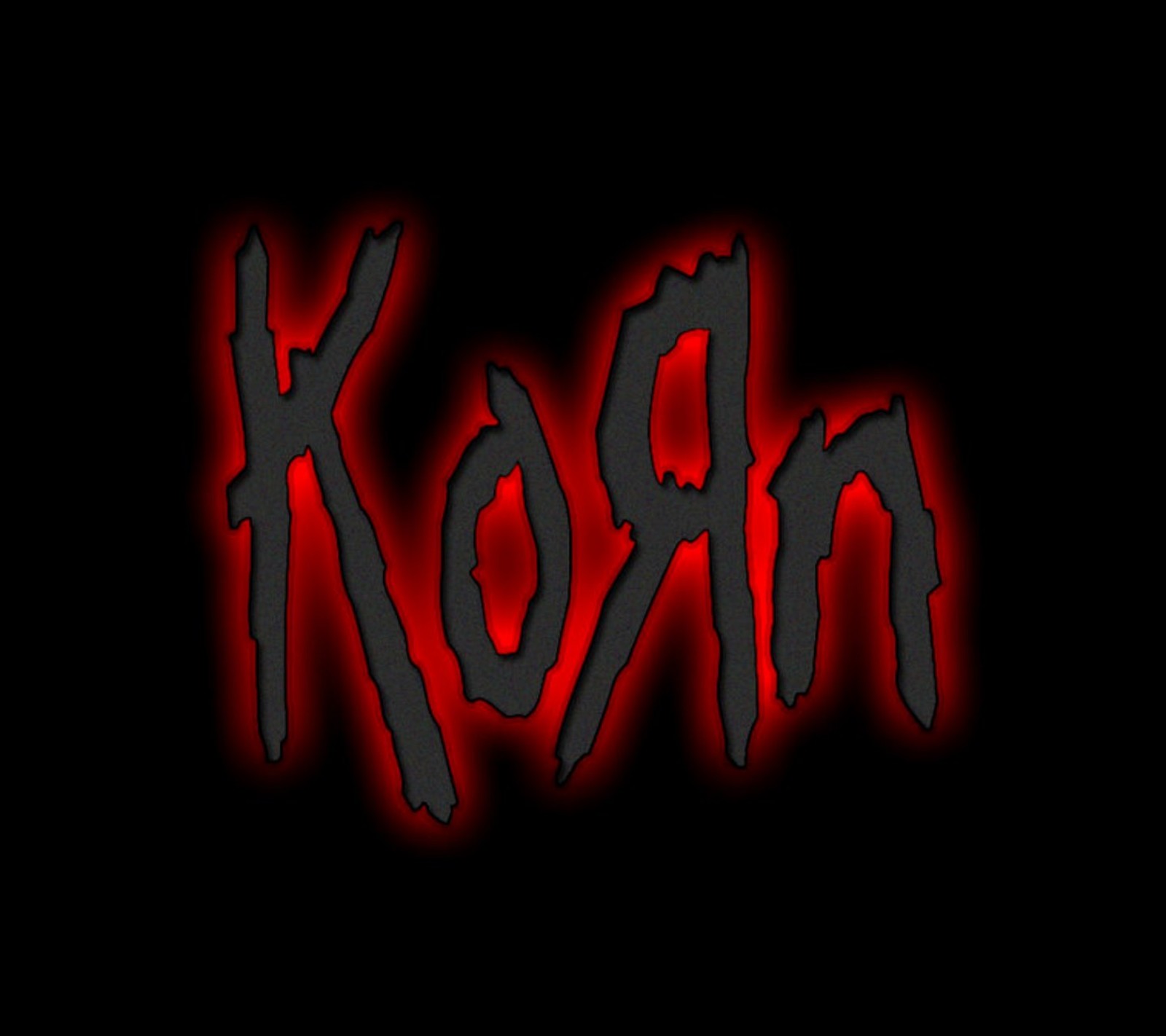 Um close de um texto vermelho e preto em um fundo preto (preto, korn, logotipo, música, vermelho)