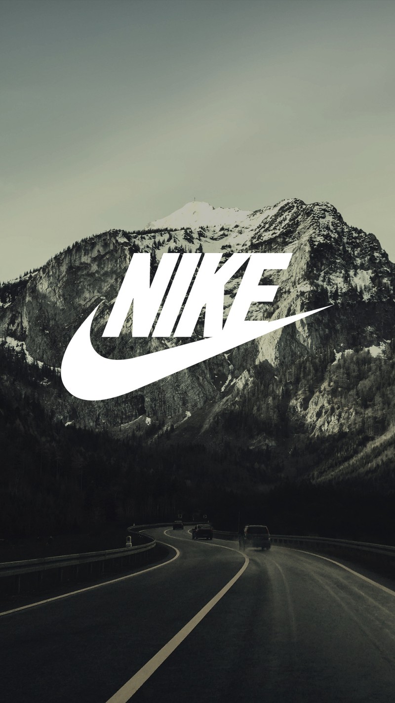 Логотип nike на горной дороге с горой на заднем плане (машина, логотип, гора, природа, nike)