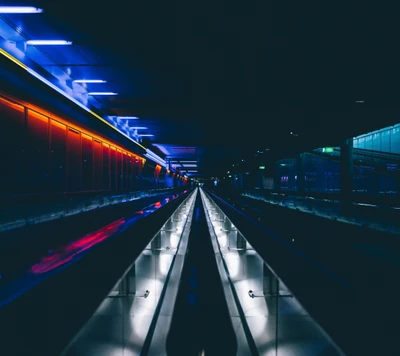 Túnel subterráneo iluminado: Una fusión de luces de Londres y Nueva York