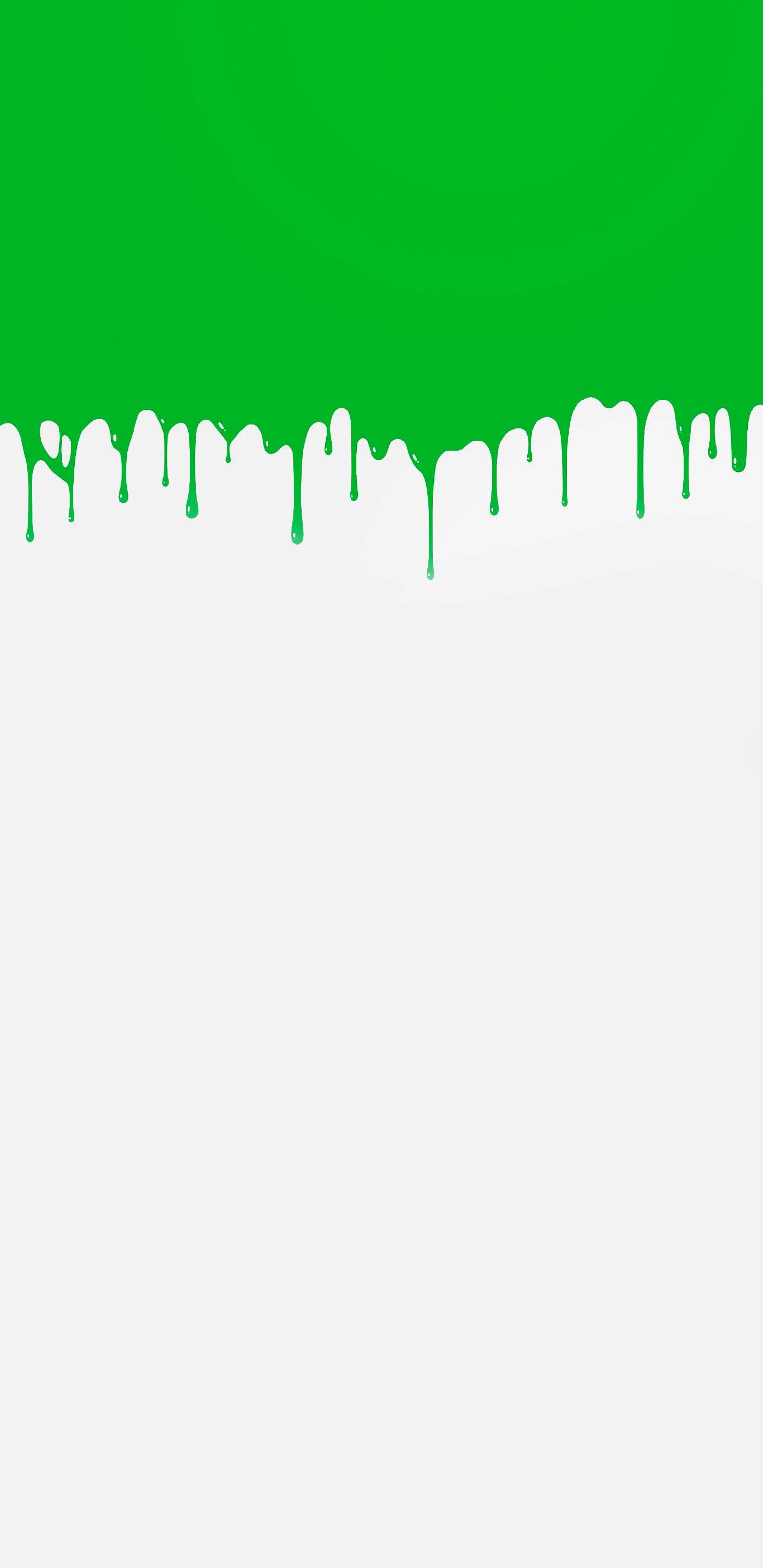 There is a green and white paint drip on a wall (green, green scream)