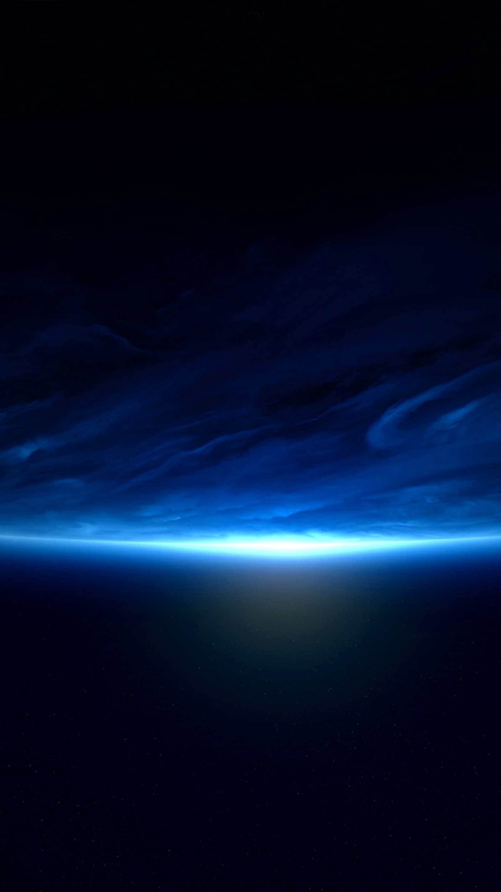 A close up of a blue light shining over a dark background (nature, planet, space)