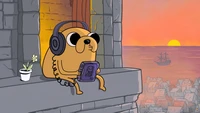 Jake the Dog enjoys lofi music while watching the sunset from a castle rooftop.