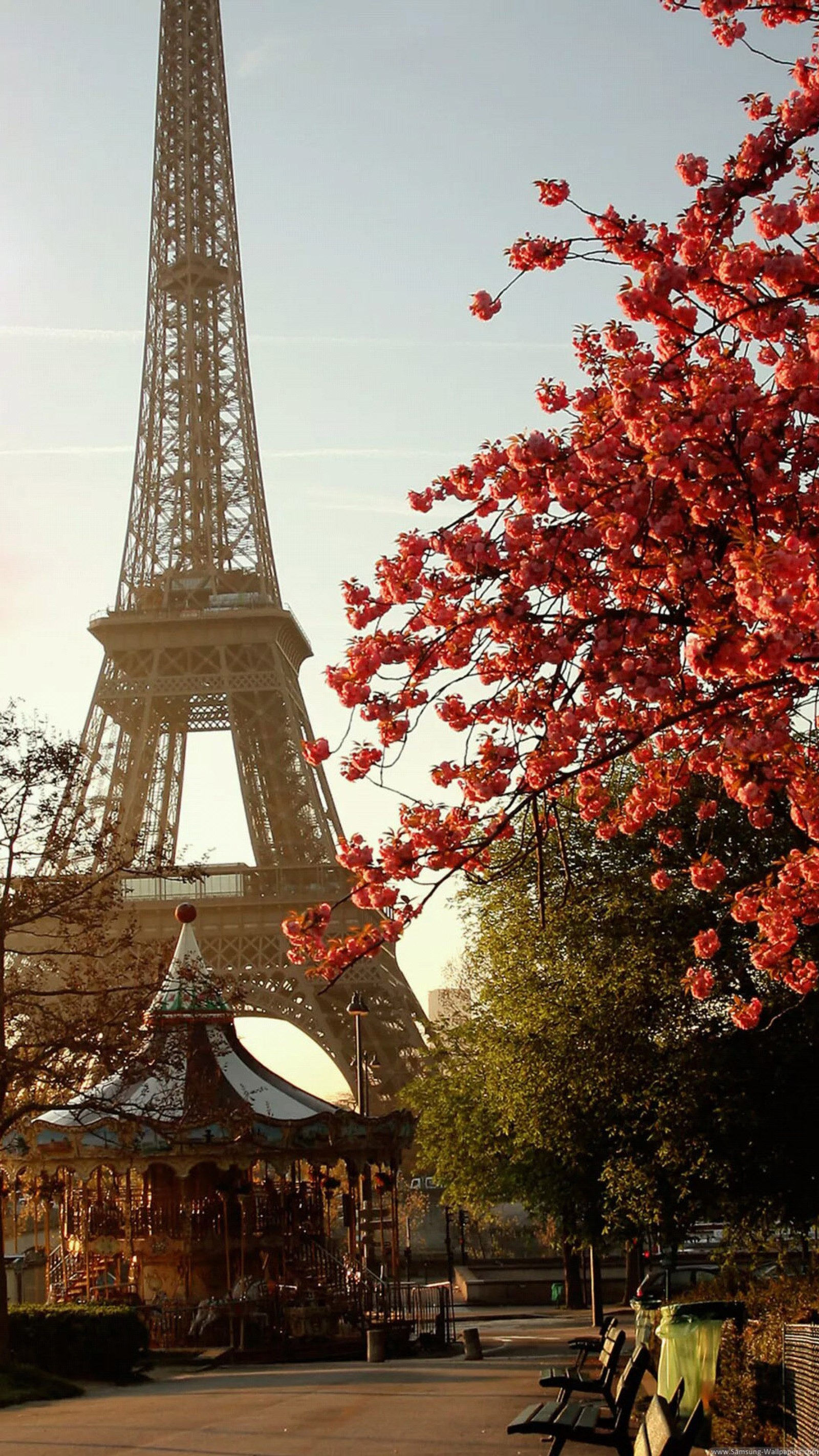 Araffe in front of the eiffel tower with a carousel in the foreground (eiffel tower, paris, tower, tour, drama)