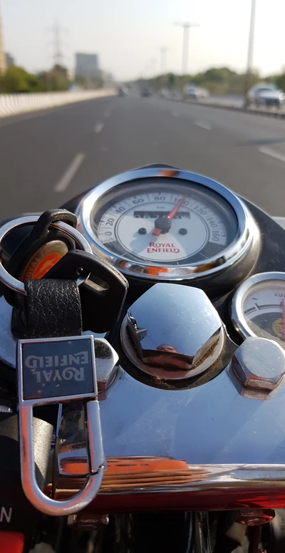 Royal Enfield in Motion: Speedometer Close-Up on an Open Road