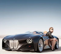 Coche concepto BMW con una chica elegante en un paisaje desértico