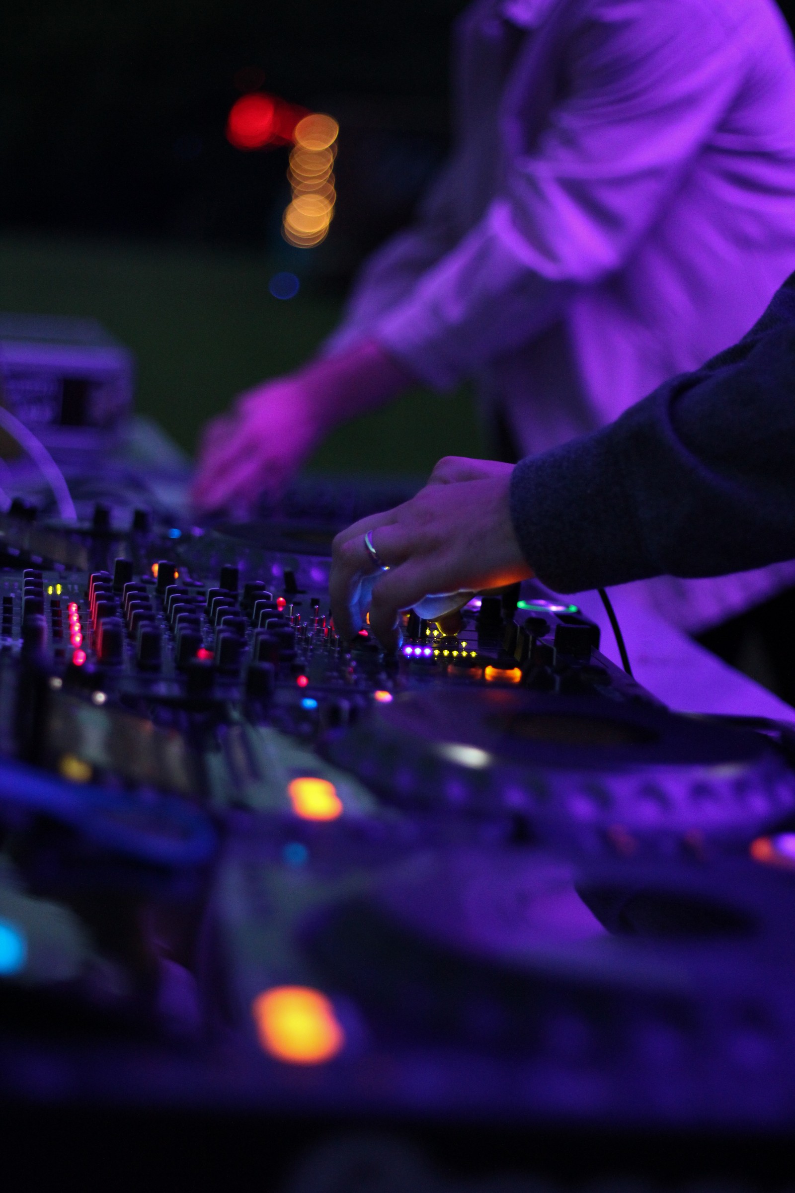 Someone is playing a dj at a party with a purple light (dj, galaxy, hd, note, sin)