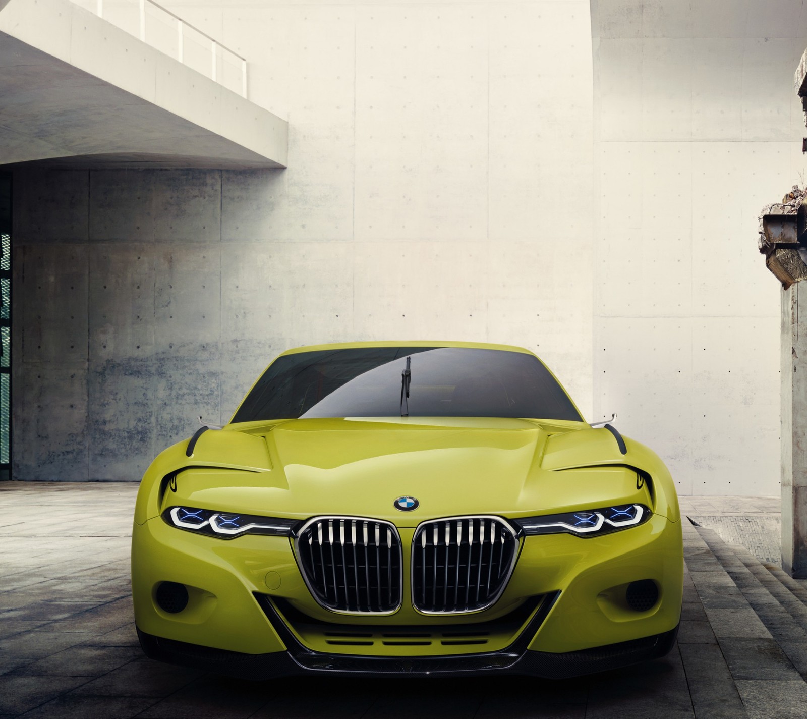 A close up of a yellow bmw concept car parked in a parking lot (bmw, germany, sports, yellow)