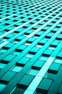 Teal Glass Facade of a Modern Office Building