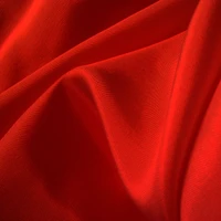 Rico textil de terciopelo rojo con sutil textura