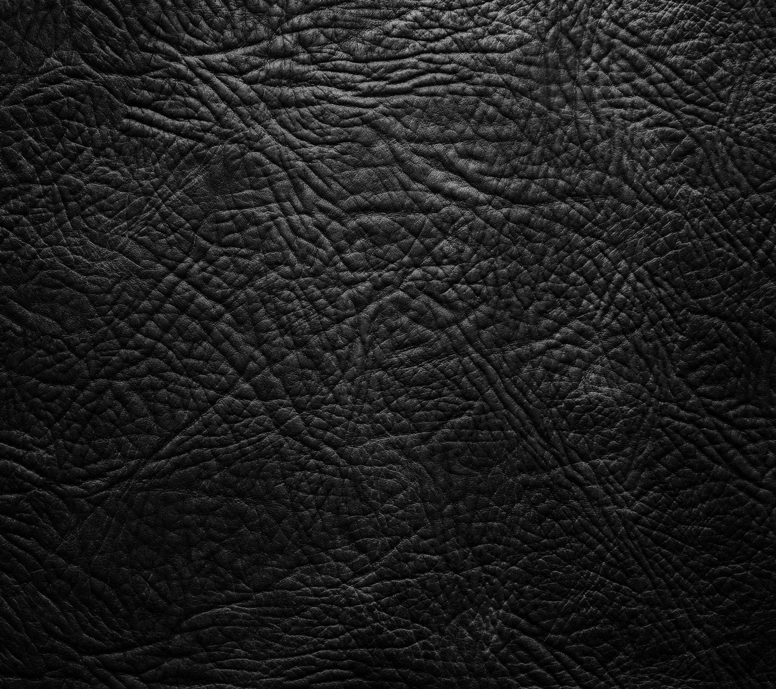 Black leather texture background with a very detailed pattern (abstract background, leather design black)