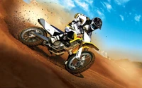 Freestyle-Motocross-Stuntperformer in Aktion auf einer Dirt Track