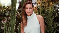 Melissa Benoist Smiling Amidst Lush Greenery