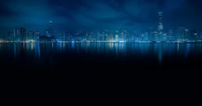 Beleuchtete Skyline von Hongkong bei Nacht