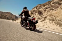 Adventure Awaits: Riding a Harley Davidson Sportster Through Mountainous Terrain