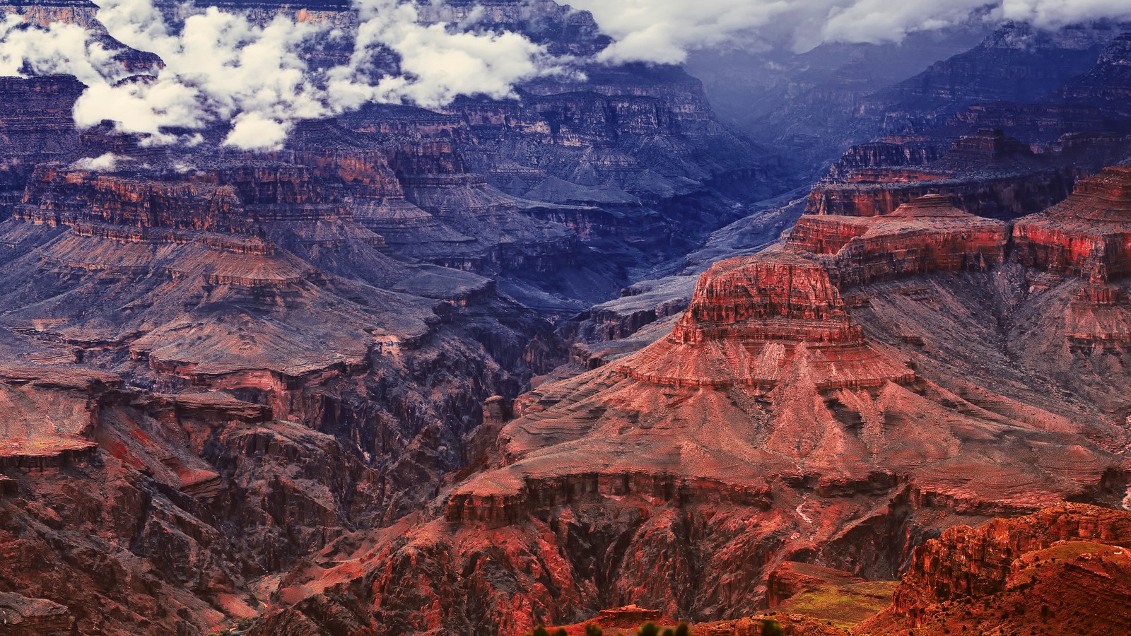 Araffe view of a canyon with a cloudy sky and a few clouds (grand canyon national park, bryce canyon national park, canyon, park, national park)