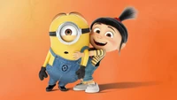 Una alegre Agnes abraza a un Minion contra un vibrante fondo naranja.