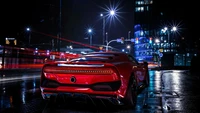 Impactante coche deportivo rojo bajo luces nocturnas en el salón del automóvil