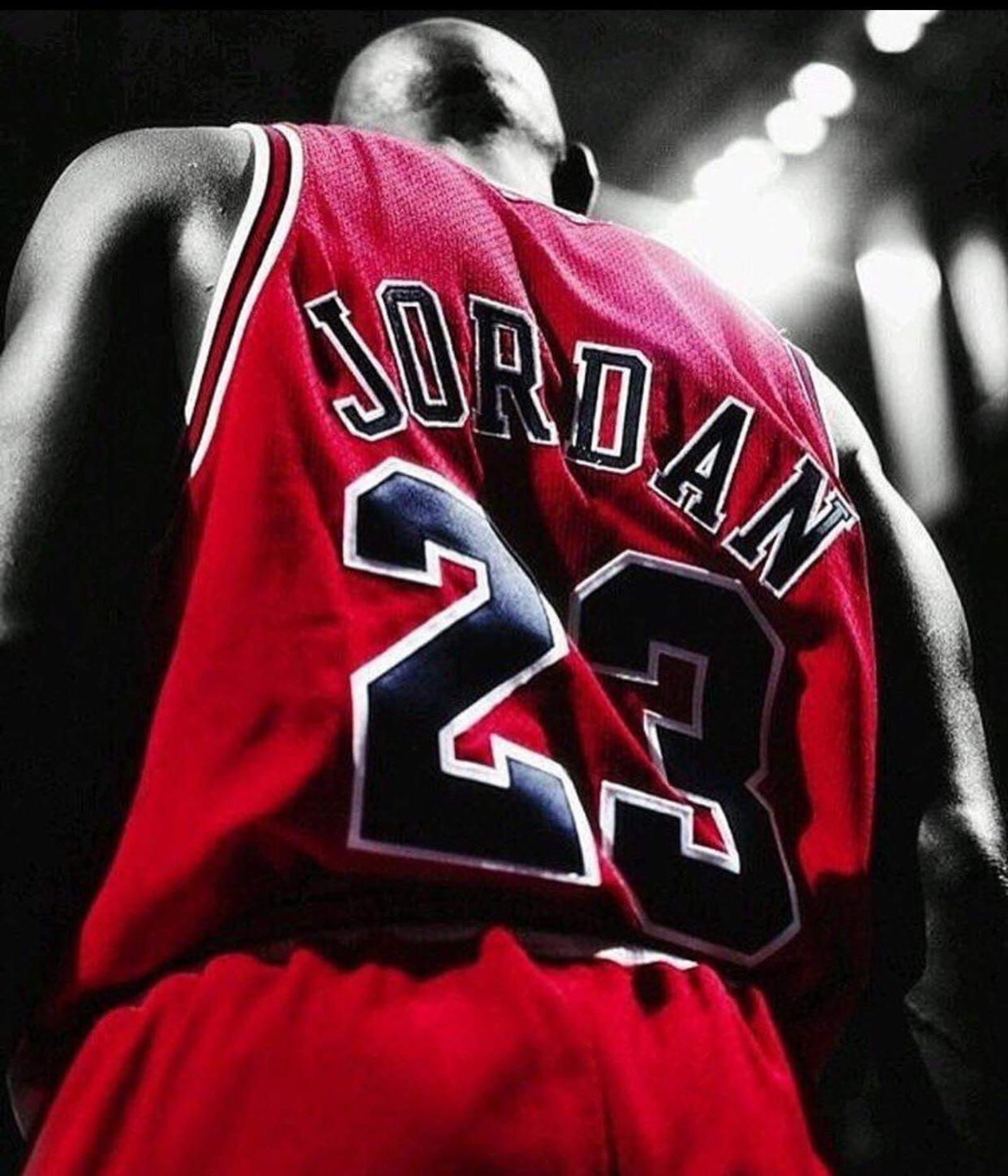 Ein bild eines basketballspielers in einem roten trikot (jordan, michael jordan, der beste)