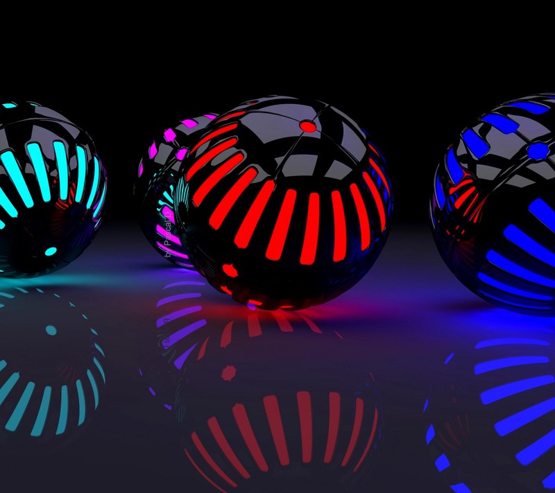 Three black and blue spheres with glowing lights on a reflective surface (hu, xs)