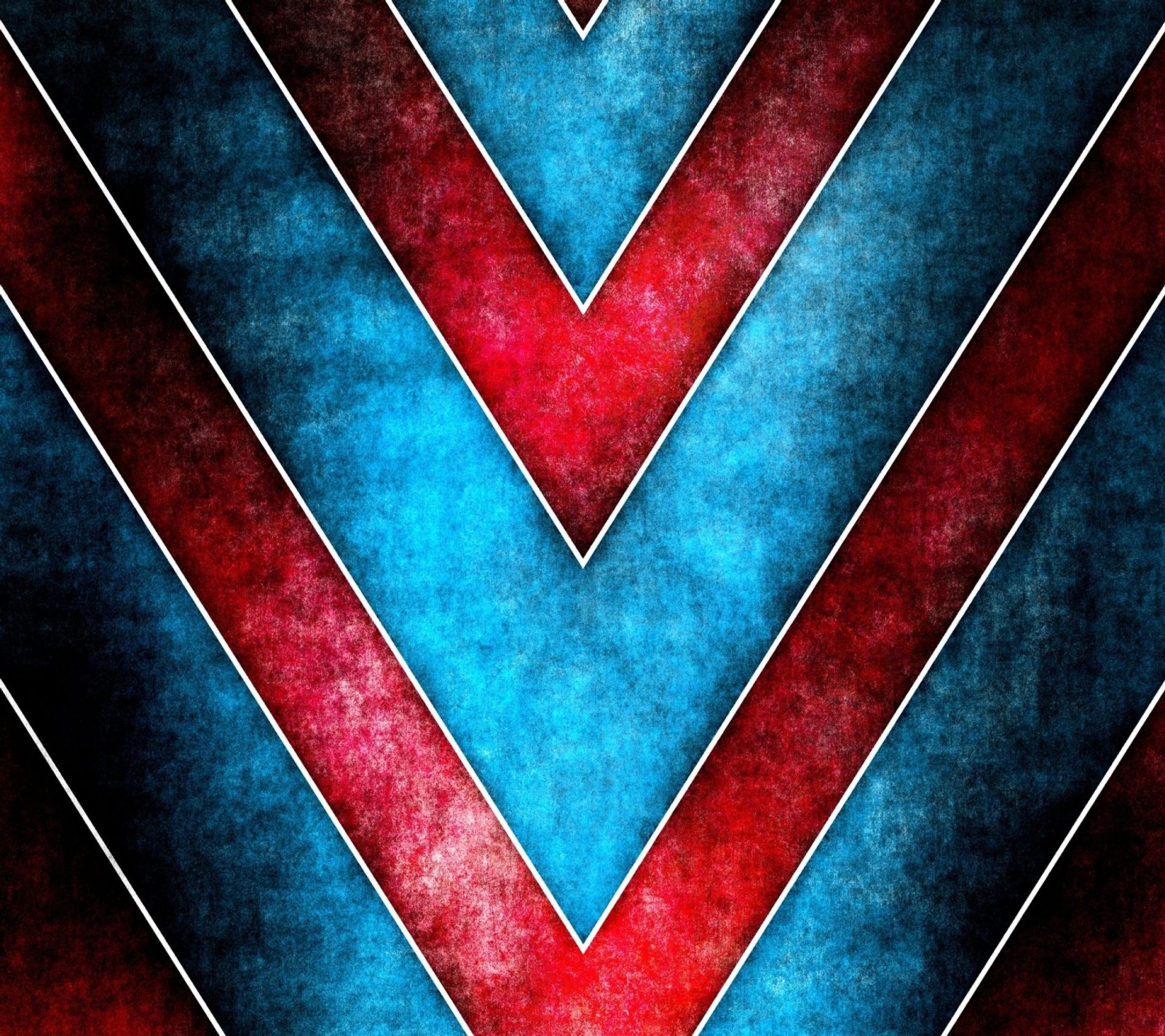 A close up of a red and blue chevroned background (abstract, other)