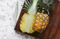 Freshly Cut Pineapple on a Wooden Cutting Board