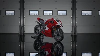 2023 Ducati Panigale V4 R: Uma impressionante moto esportiva em um ambiente de garagem moderno