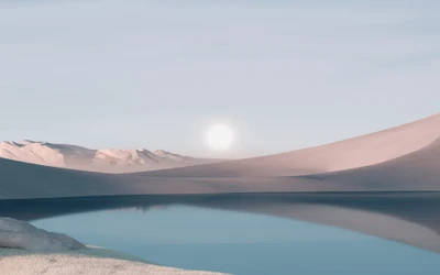 Lever de soleil sur un paysage désertique serein avec des reflets dans une eau calme