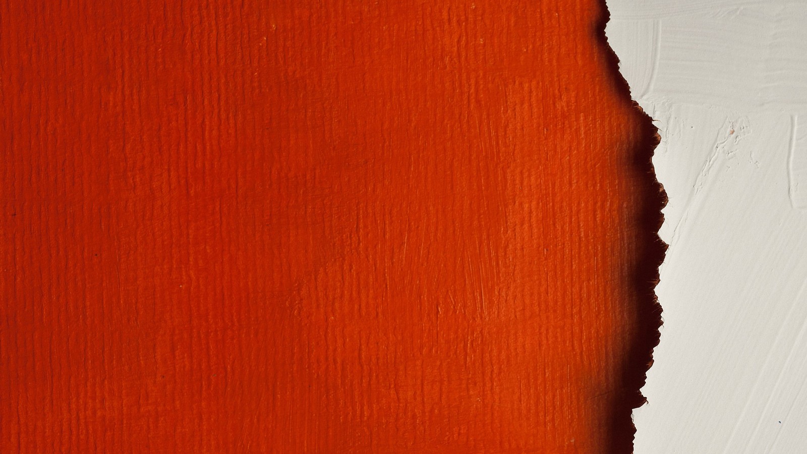 A close up of a piece of wood with a red paint (texture, red, orange, wood, peach)