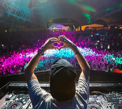 DJ Avicii Spreading Love Through Music at a Vibrant Party