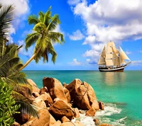 Tropical Coastline with Palms and a Sailing Ship on Azure Waters