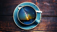 Cosmic Reflections: The Night Sky Captured in a Coffee Cup