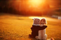 Embracing Friendship: A Boy and His Dog in the Morning Sun