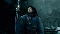 Main Character of 'Rise of the Ronin' Holding a Sword in a Snowy Landscape