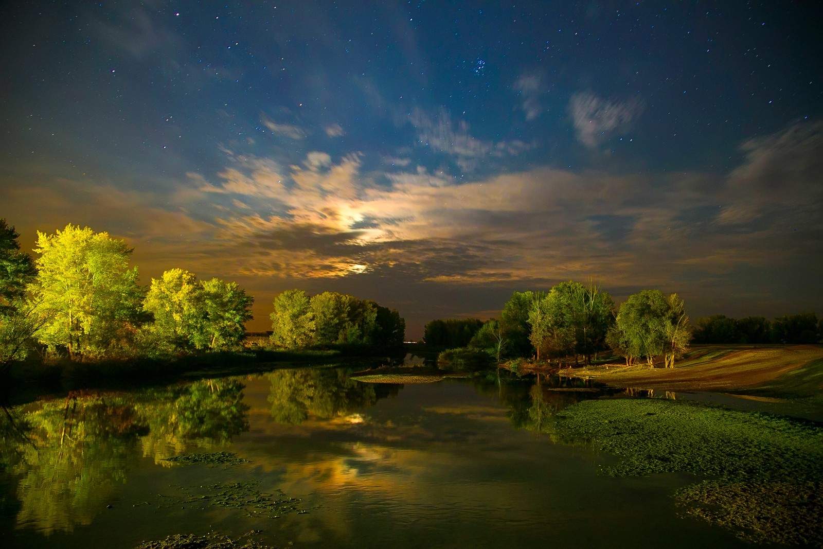 A view of a lake with a full moon in the sky (nature, sunset, reflection, cloud, bank)