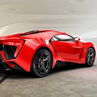 Supercar rouge époustouflant Nek dans un garage moderne élégant