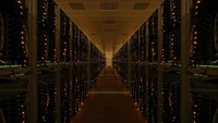 Symmetrical Server Room Illuminated in Nighttime Reflection