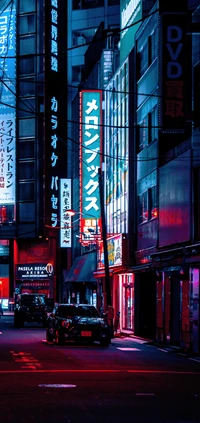 Neon-Lit Urban Street with Skyscrapers and Cars