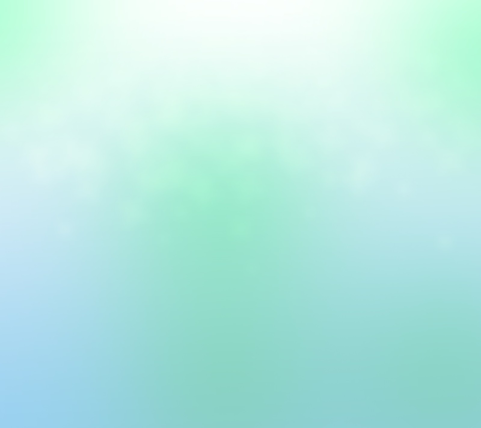 There is a blurry photo of a green and blue background (abstract, blue, design, green, light)