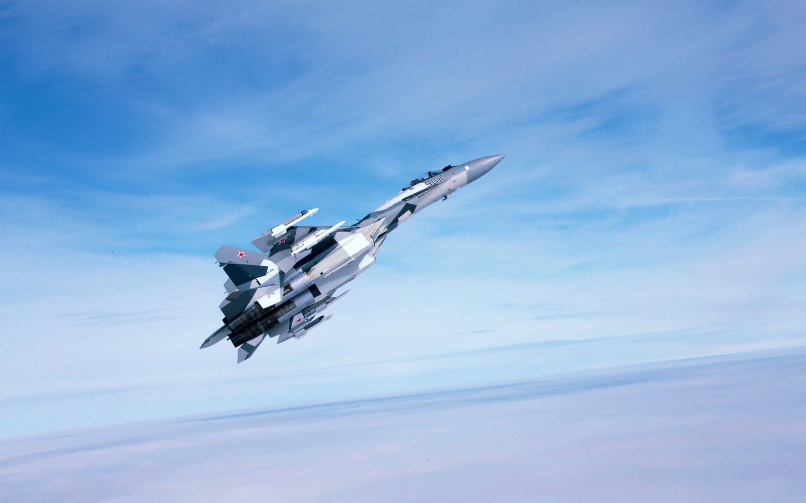 There is a fighter jet flying through the air with a blue sky in the background (aircraft, airplane, military aircraft, jet aircraft, aviation)