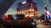 Escena metropolitana nocturna con un coche de tamaño medio en Need for Speed Payback