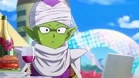 Piccolo relaxando com lanches e um laptop em Dragon Ball Daima