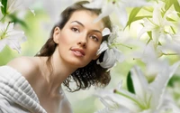 Radiant Woman Amidst White Lilies