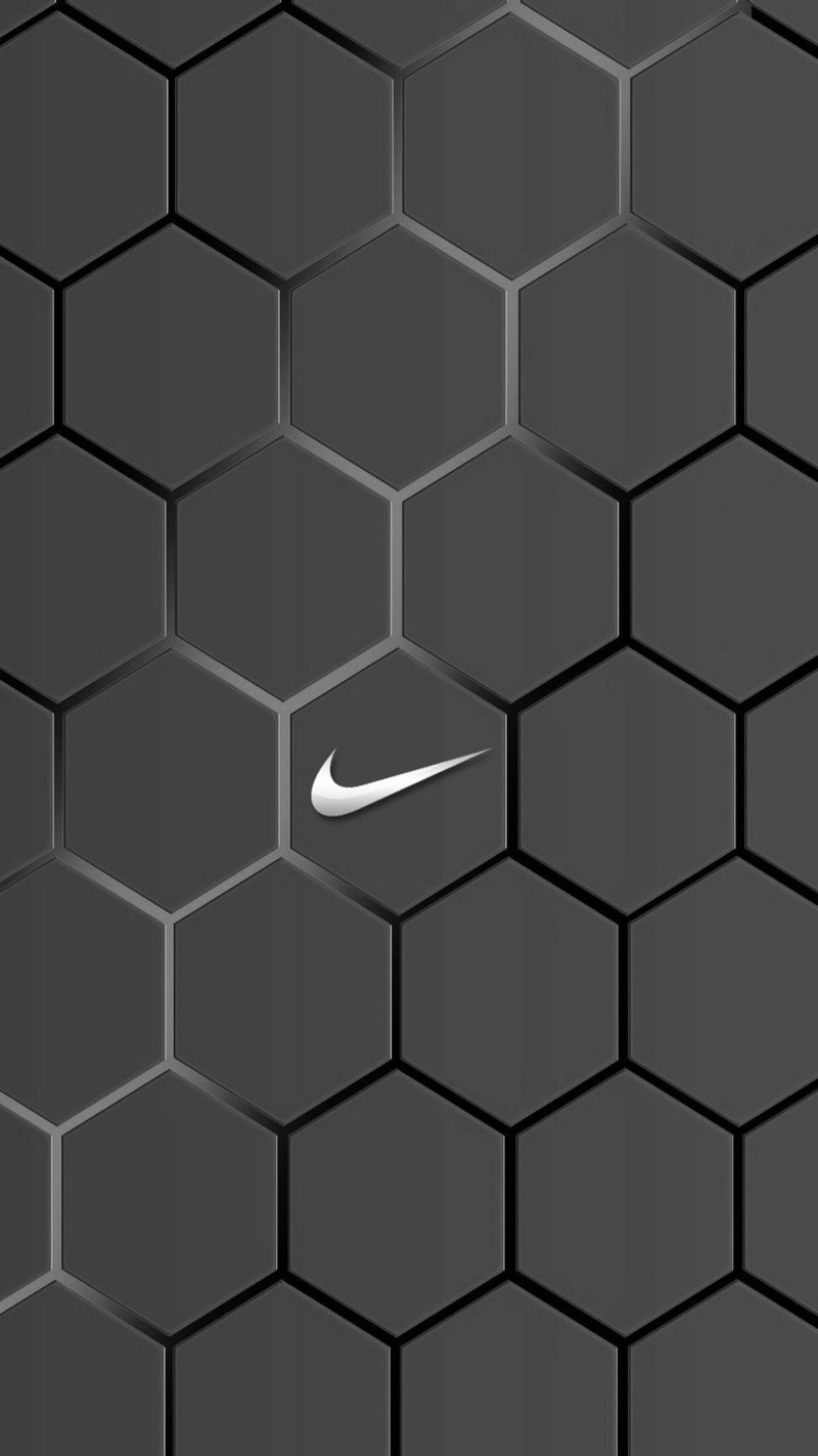 Крупный план черно-белой стены с белым логотипом nike (логотип, nike)