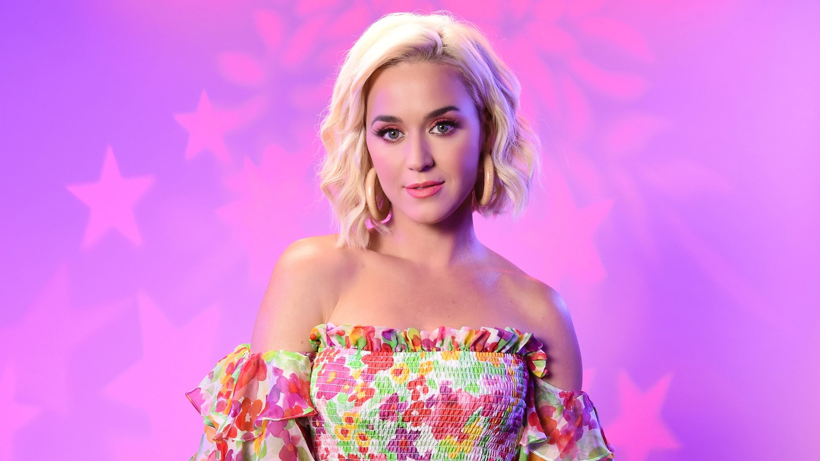 A close up of a woman in a colorful dress posing for a picture (katy perry, pink aesthetic, american singer, pink background, girly backgrounds)