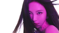 Ningning from Aespa radiates confidence with striking purple lighting and flowing hair.