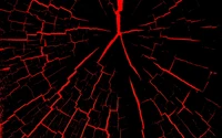 Symmetrical Red Patterns on Black: A Spider Web of Cracks