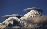 Majestic Stratovolcanoes Under a Cloudy Sky