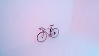 Vélo rose élégant sur un fond minimaliste