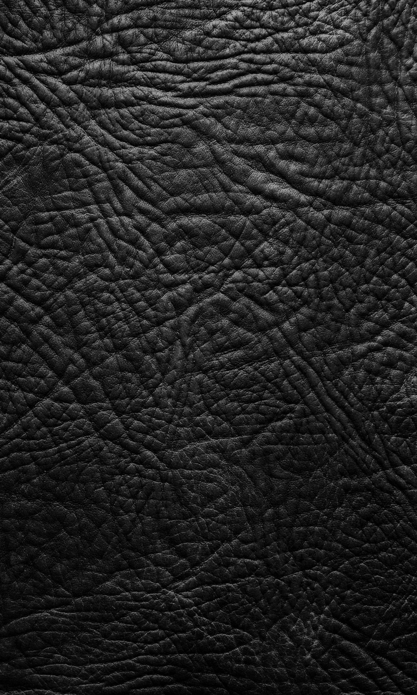 Black leather texture background with a very detailed pattern (abstract background, leather design black)